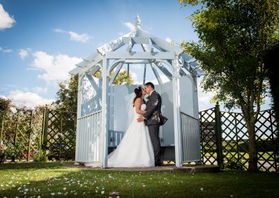 Bride and Groom kissing at Pastures lodge captured by professional wedding photographers Doncaster