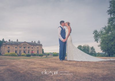 Kissing bride and groom outside at Wortley Hall Sheffield