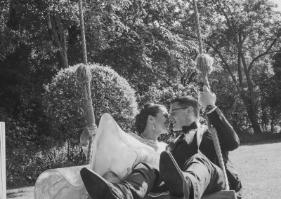 Bride and Groom on a swing at one of the best wedding venues in South Yorkshire
